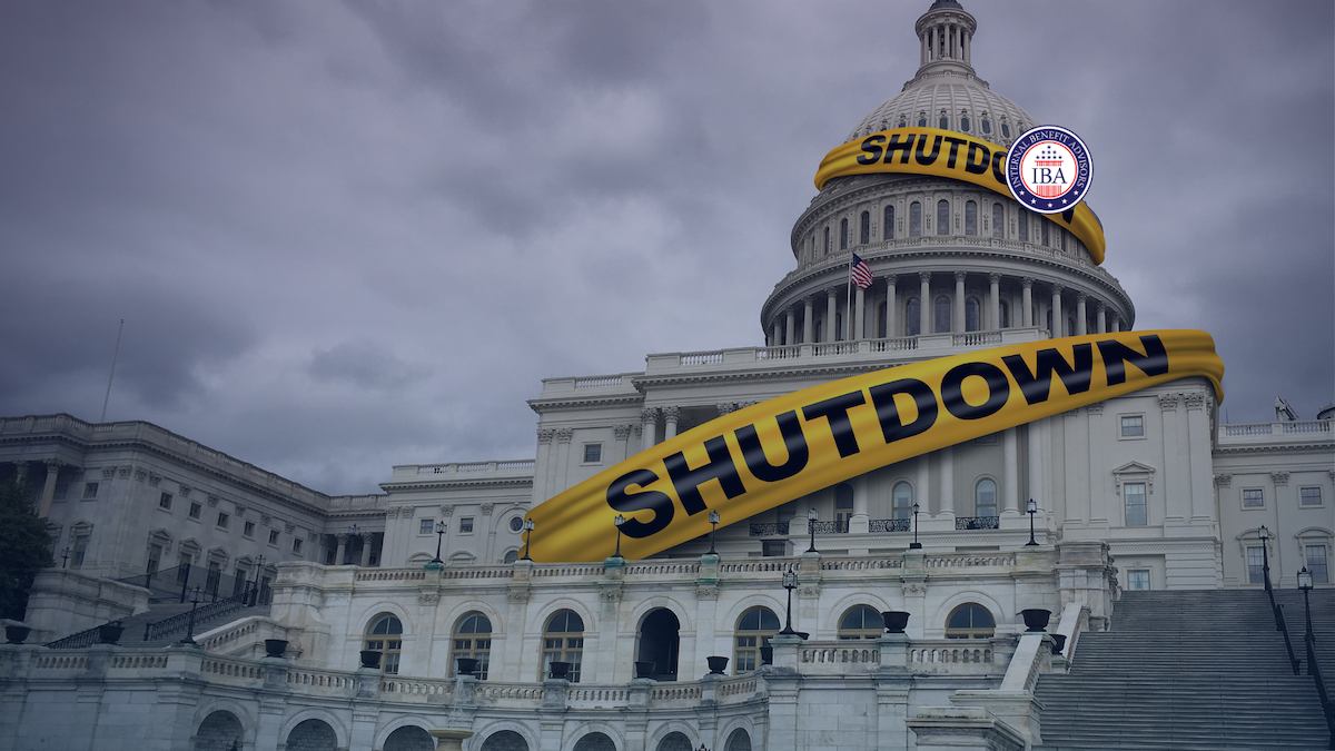 The Capitol building wrapped in yellow tape reading SHUTDOWN under a dark stormy sky