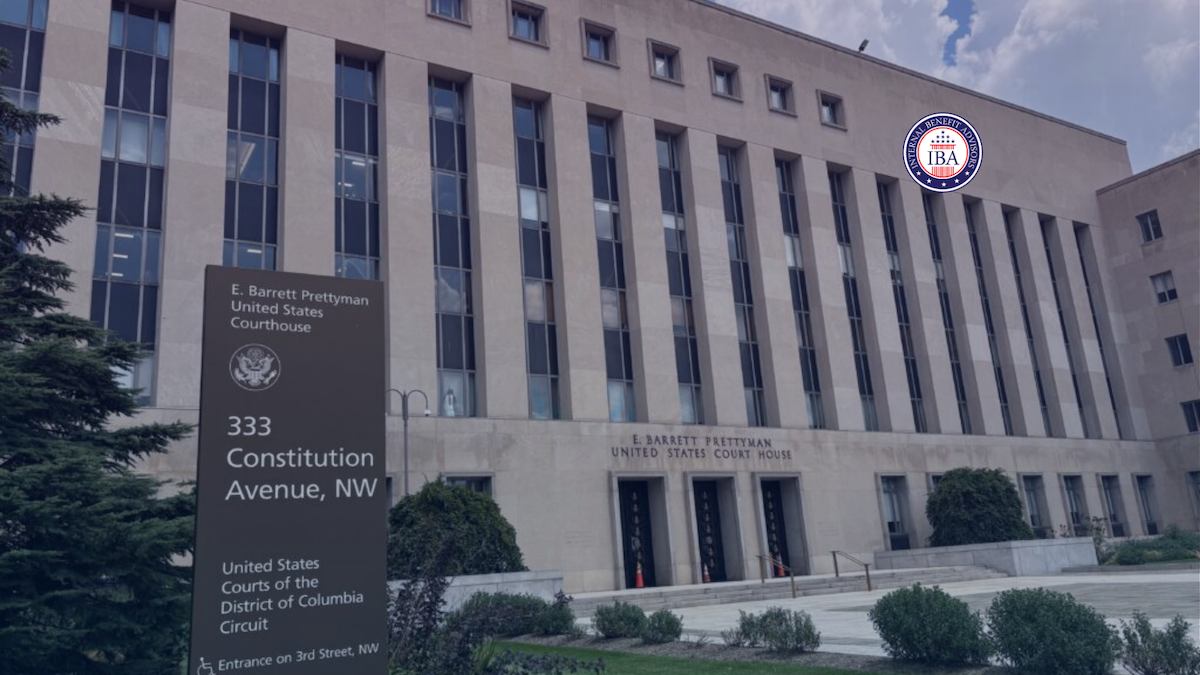 A sign reading 333 Constitution Avenue NW outside the E. Barrett Prettyman United States Courthouse