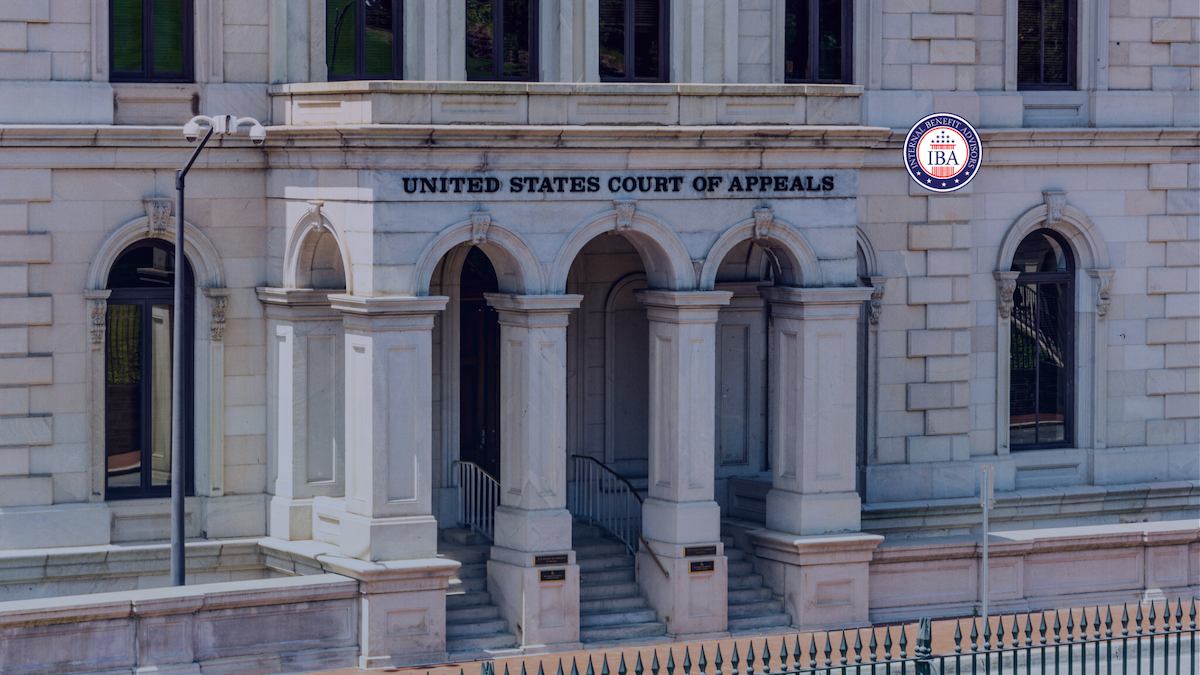 The stone facade of a United States Court of Appeals building with arched entrances
