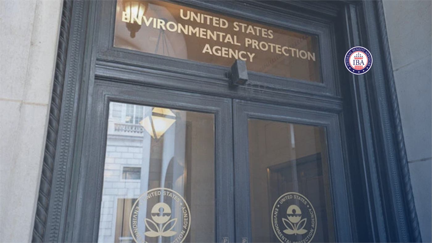 The entrance to the United States Environmental Protection Agency building, with agency seals beside the door