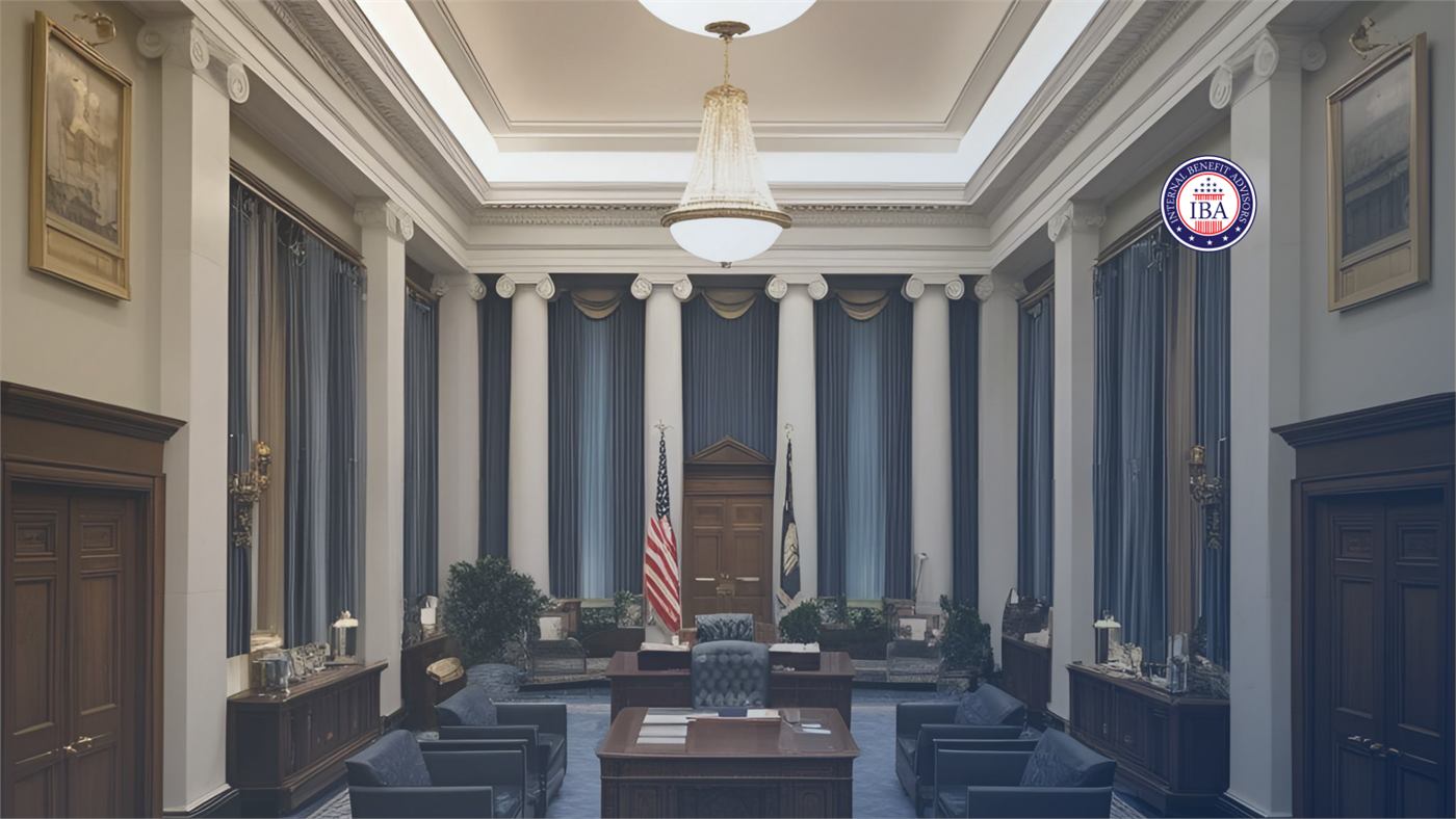 An empty courtroom with a judge's bench, flags and tall columns