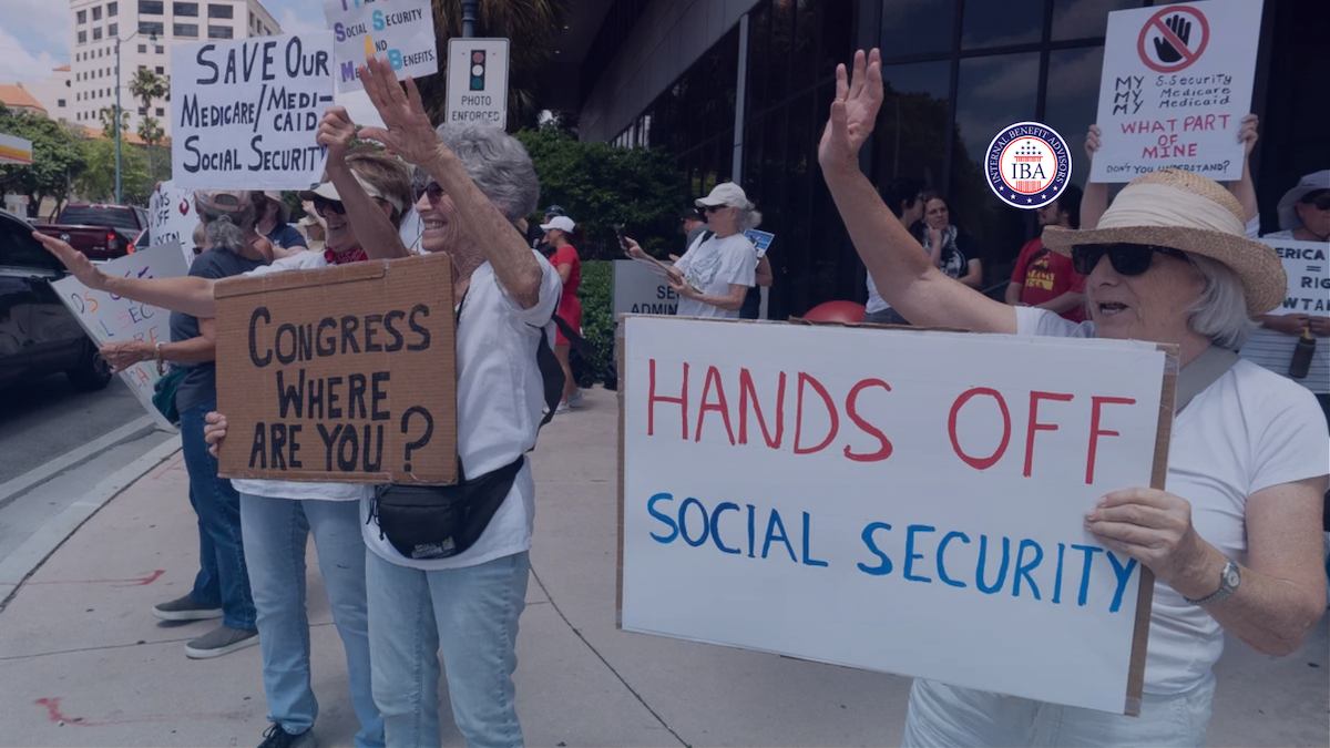 Demonstrators holding handmade signs reading Hands Off Social Security and Congress Where Are You?