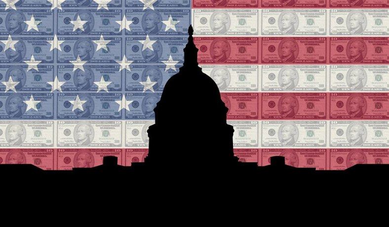 A silhouette of the Capitol dome against an American flag made from banknotes