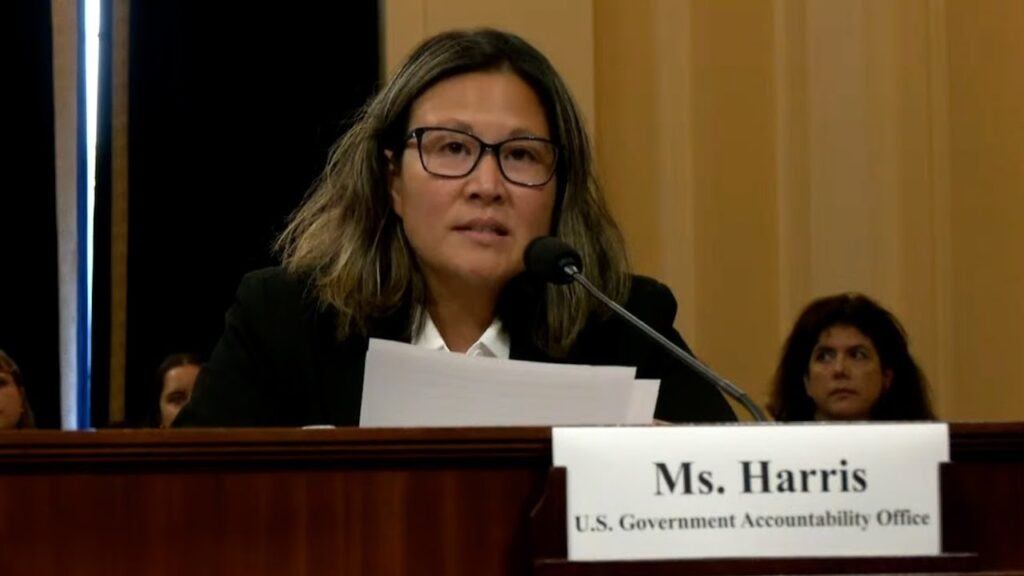 Ms. Harris of the U.S. Government Accountability Office testifying at a congressional hearing