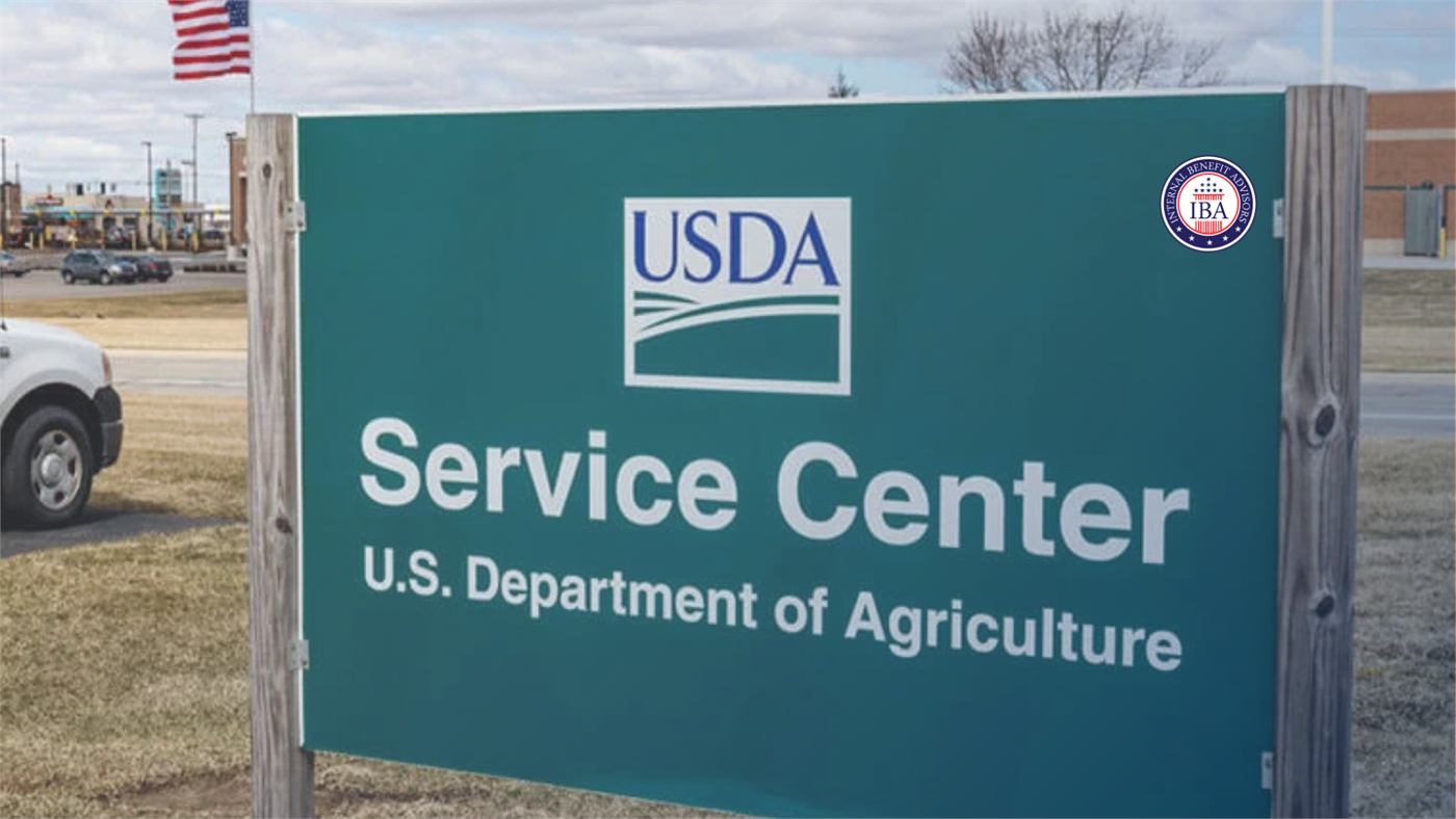 A green roadside sign reading USDA Service Center, U.S. Department of Agriculture