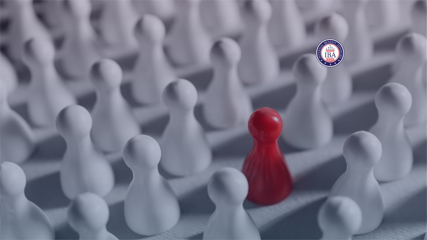 A single red game piece standing among rows of white ones