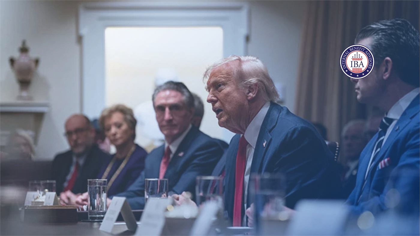 Donald Trump speaking with officials seated around a meeting table