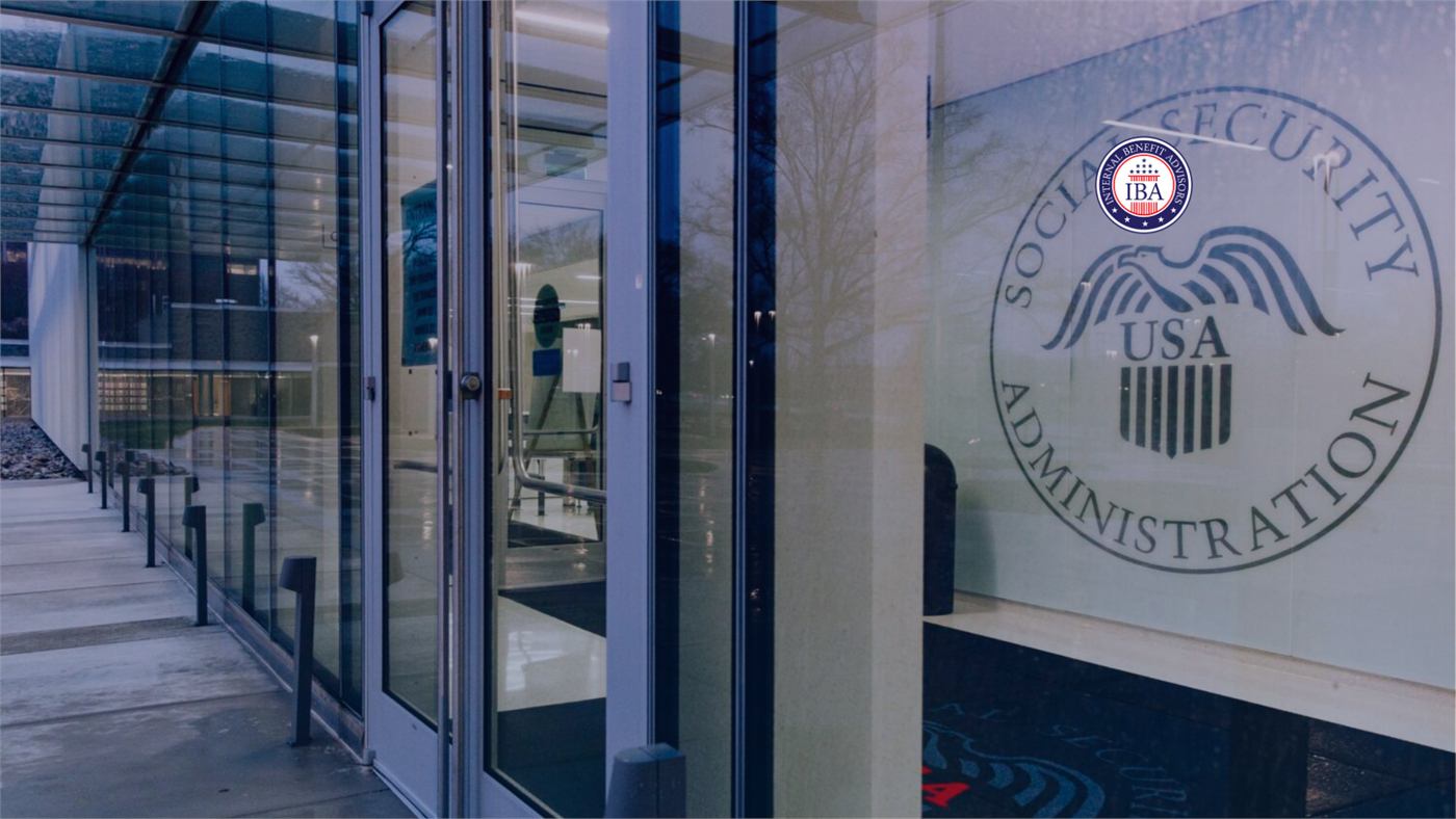 The Social Security Administration seal on the glass wall of a modern building