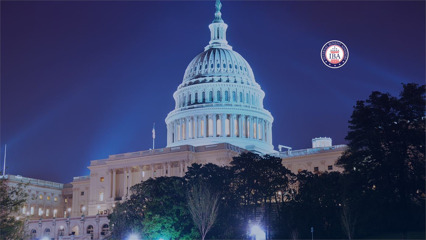 The United States Capitol lit against a night sky