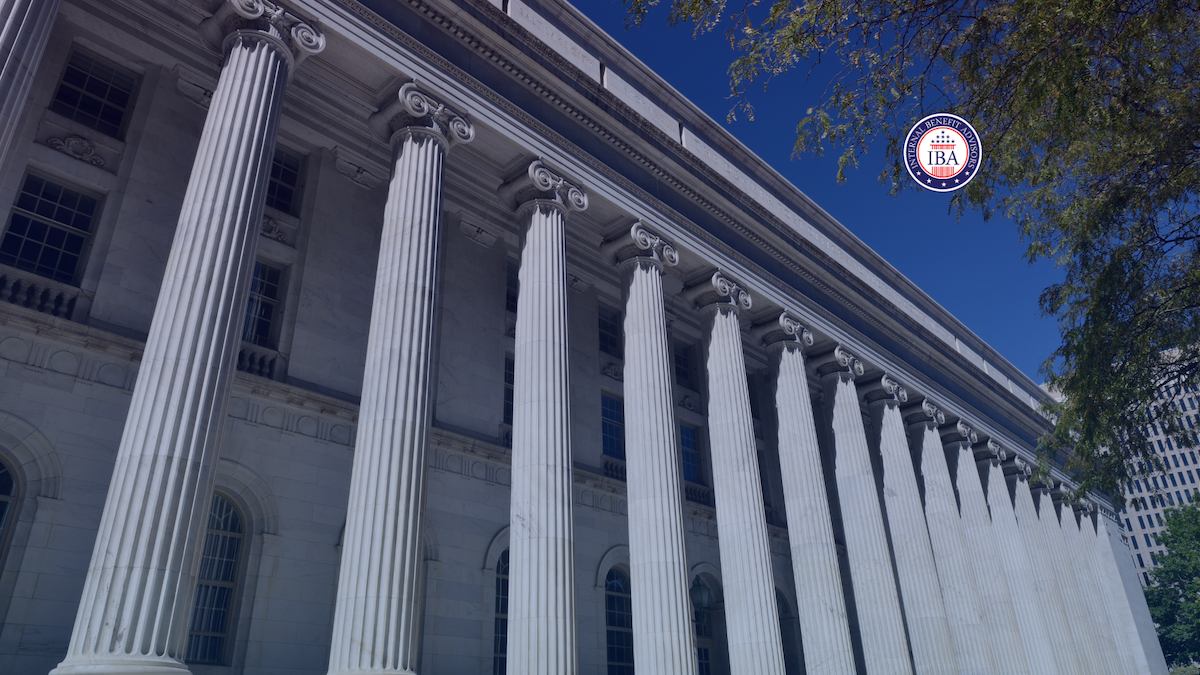 Looking along the row of columns of a classical government building