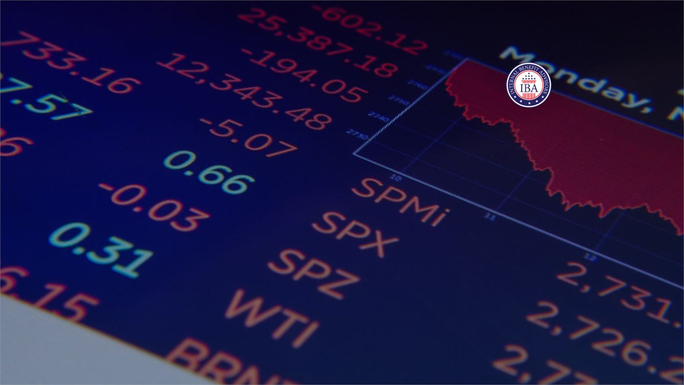 A financial data screen showing index values beside a falling red chart