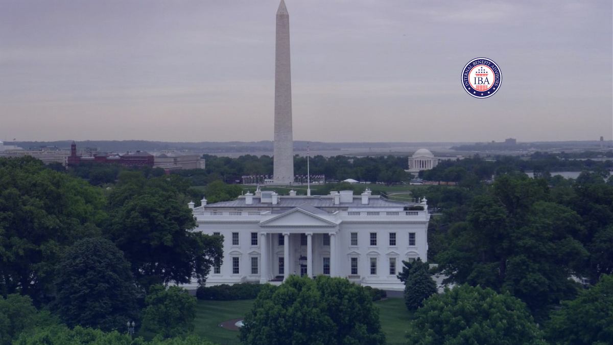 The White House with the Washington Monument rising behind it