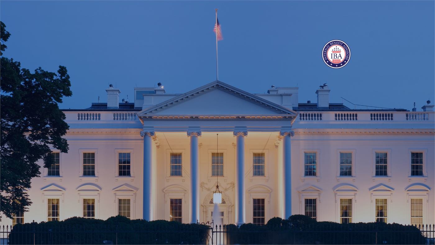 The White House lit at dusk